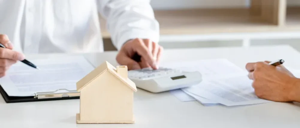 Investors analyzing short term rental profitability with property income documents